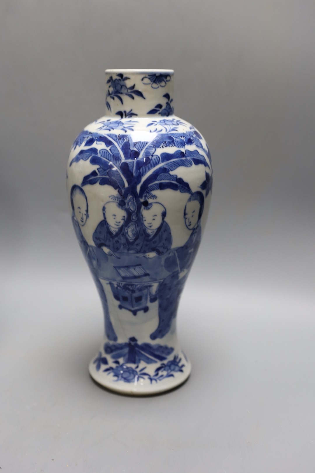 A pair of Chinese blue and white ‘boys’ baluster vases and a Chinese blue and white jar, 19th-century and later 27cm